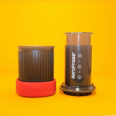 AeroPress Go portable coffee maker with travel mug, compact brew kit for travel