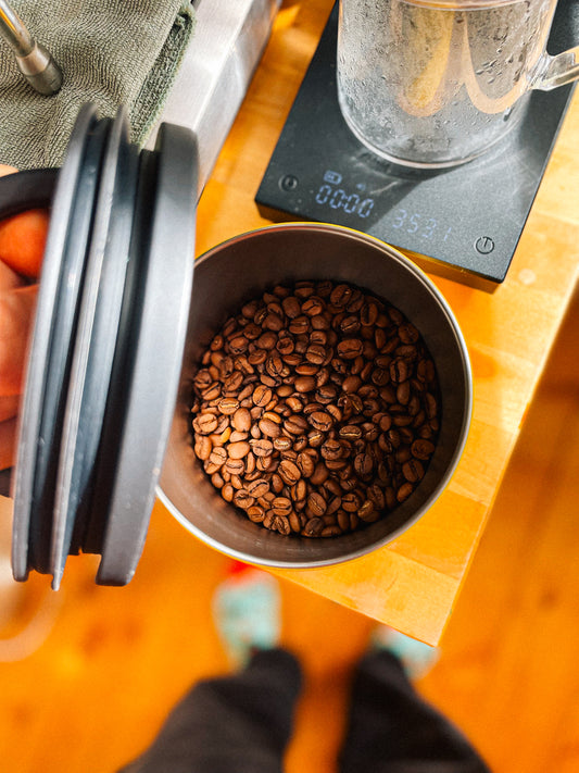 Coffee beans in a yellow air scape storage canister