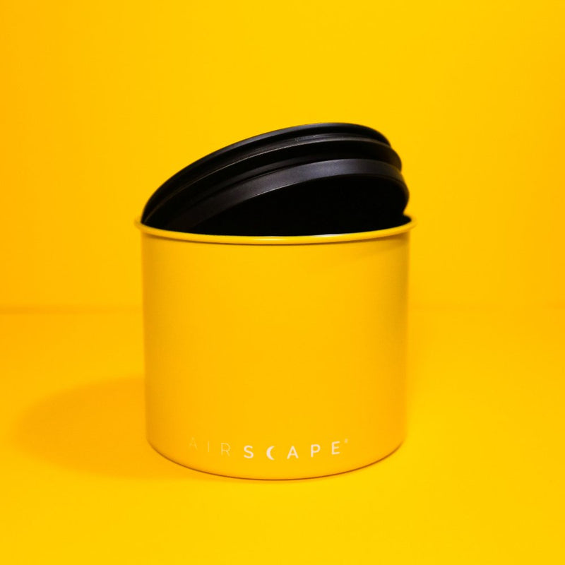Airscape canister lid mechanism, patented inner lid removes air to keep beans fresh