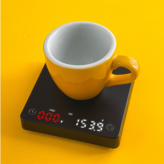 Compact coffee scale showing display, 3 brewing modes, fits espresso drip tray